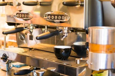 Close-up of espresso coffee machine. Professional coffee brewing Stock Photos
