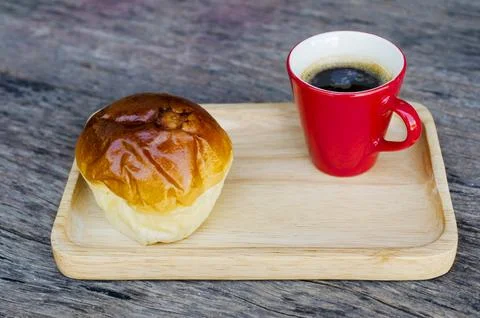 Close up of Espresso coffee red cups and Bun bread Stock Photos
