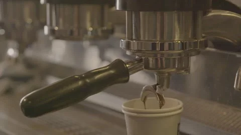 Close Up of Espresso Machine Brewing Coffee Into Takeaway Cup in Sydney Cafe Stock Footage 345692617