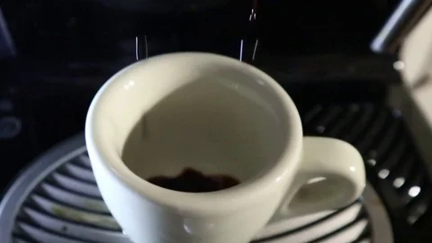 Close-up of espresso pouring from coffee machine Stock Footage 102032721