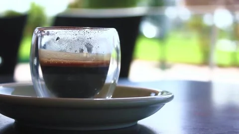 Close up espresso shot with a blurry background Video stock 286110511