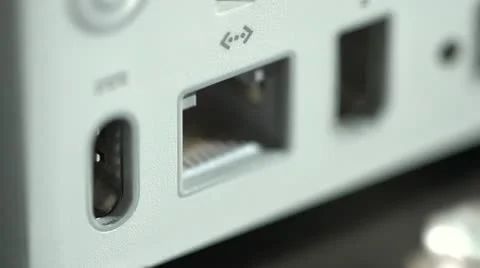 Close up of ethernet cable being plugged in Stock Footage
