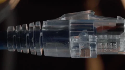 Close Up of Ethernet Network Cable Connector with Transparent RJ45 Plug Stock Footage 347145950