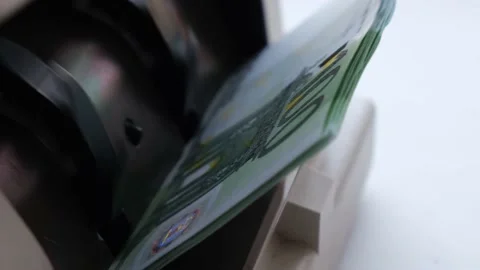 Close-up of euro banknotes in counting machine. Automatic money counting in the Stock Footage 153567135