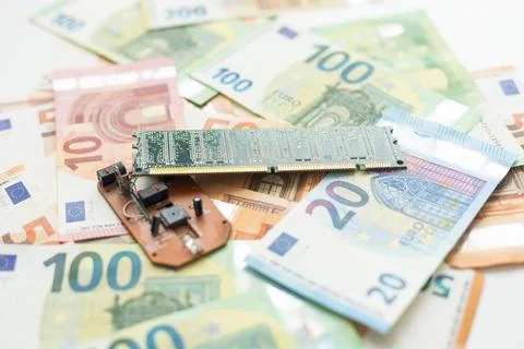 Close-up of EURO banknotes with microprocessors on top Stock-Fotos