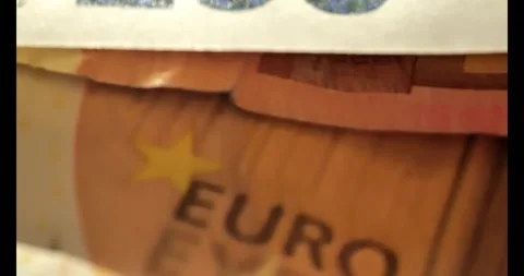 Close-up of Euro banknotes  in sunlight Stock Footage 274841735