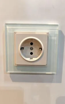 Close‑up of a European‑style electrical wall socket Stockfoto's
