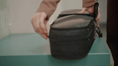 Close examination of musical instrument before practice. Musician thoroughly Stock Footage 346555431