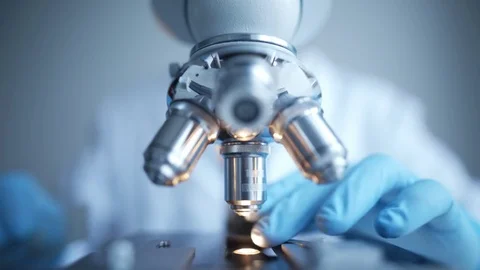 Close up of examining of test sample under the microscope Video stock 85139795