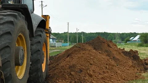 Close up of an excavator digging a deep trench Stock Footage 157848412