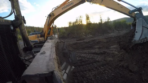 Close up of excavator picking up piles of clay, United States Video stock 138895983