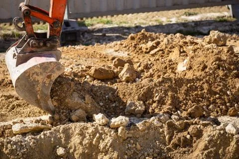 Close-up of excavator working on construction site Stock Photos