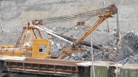 Close-up of excavator working on a quarry. Mining equipment. Stock Footage 99712431