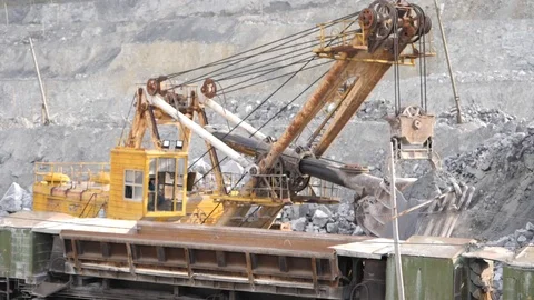 Close-up of excavator working on a quarry. Mining equipment. Stock Footage 99712446