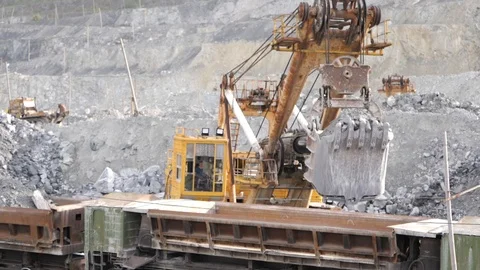 Close-up of excavator working on a quarry. Mining equipment. Stock Footage 99712459