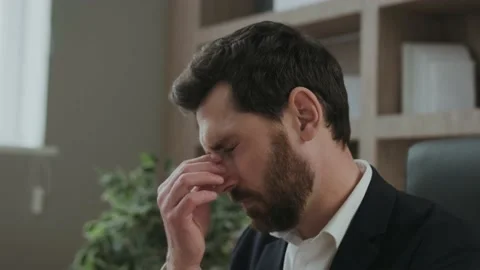 Close up of an executive or an office worker closing his eyes from the tiredness Stock Footage 171242064