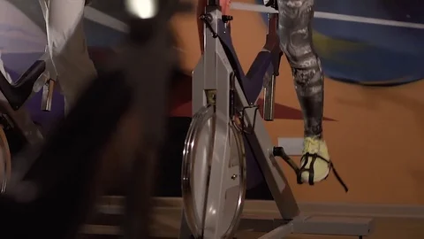 Close-up of exercise bikes in use of people doing fitness Stock-Footage 74143778