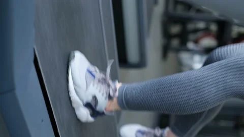 Close-up, exercising on a treadmill, cardio training in the gym. Stock Footage 222649919