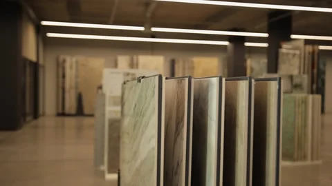 Close-up of exhibition samples of large ceramic tiles in a construction Stock Footage 301166405