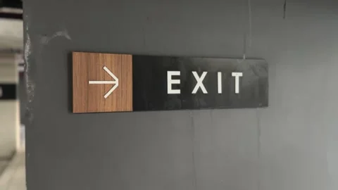 Close-up of “Exit” sign with arrow Stock Footage 312097084
