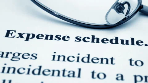 Close up of expense schedule form dolly shot Stock Footage 305412644