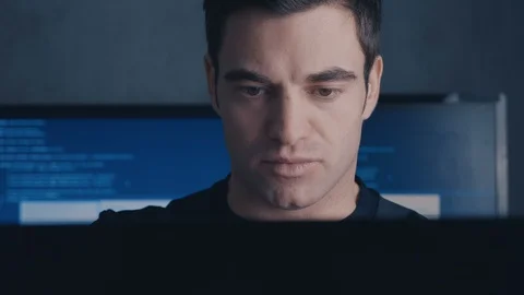 Close-up of Experienced Programmer Developer works on a new program Young man Stock Footage 102142545