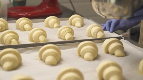 A close-up of an expert chefs hands in gloves holding culinary silicone brush Stock Footage 107465067