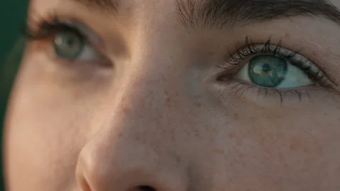 Close up of Expressive Woman's Eyes Opens and looking at the Sun. Dreamy Young Stock Footage 157922293