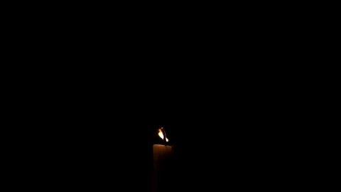 Close up of extinguished candle flame isolated on black background Stock Footage 294948157