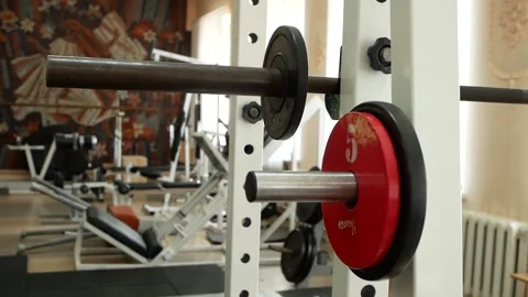 Close up of extra weights for the barbell. Weight plate for barbell in the gym. Stock Footage 157691181