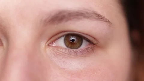 Close-up extreme macro shot of a human eye showing intricate details and texture Stock Footage 339212524