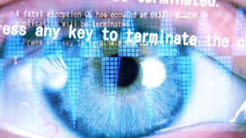 A close-up eye with computer error code 動画素材 232382918