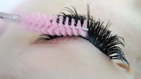 Close up of eye with eyelash extensions ,beauty salon treatment Stock Footage 264522371