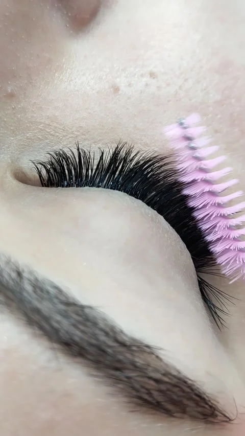 Close up of eye with eyelash extensions ,beauty salon treatment Stock Footage 278570421