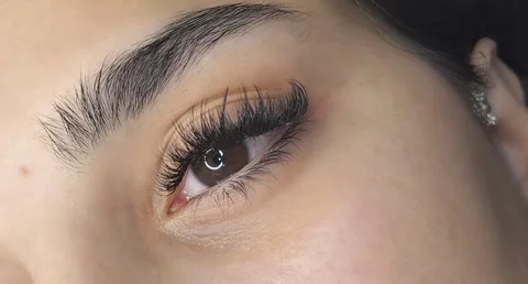 Close up of eye with eyelash extensions ,beauty salon treatment Stock Footage 318342541