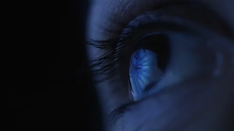 Close up eye female looking at hyperspace vortex Stock Footage