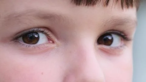 Close up of Eye of Kid Blinking. Macro Stock Photos