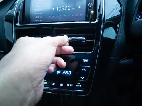 Close-up (eye-level angle) left Asian hand, adjusting direction. Stock Photos