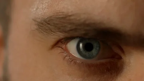 Close-up, the eye opens and looks at the camera Stock Footage 323389091