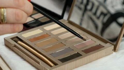 Close up of eye shadow. Professional makeup artist working Stock Footage 105600063