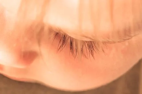 Close-up of eye of a sleeping child Stock Photos