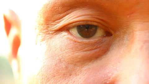 Close up eye of  Thai man looking at camera , out door  Chiangmai  Thailand Stock Footage 147316222