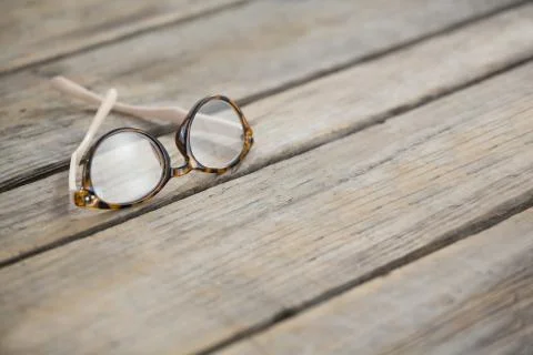 Close up of eyeglasses on table Stock Photos