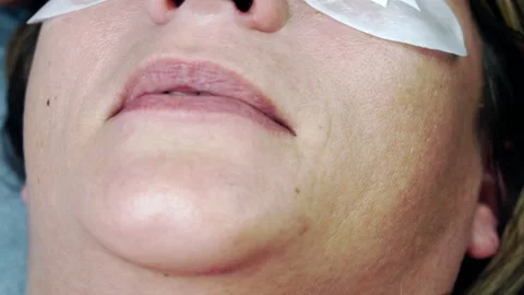 Close-up of the eyelash extension process. Stock Footage 164060127