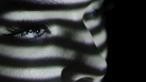  Close up eyes of girl with an abstract pattern of lines. Stock Footage 104601180