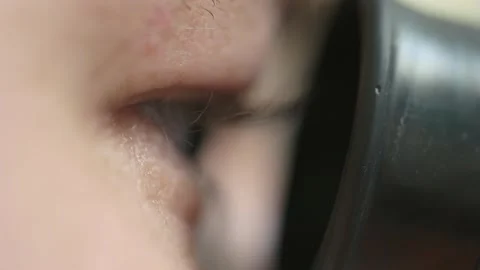Close-up eyes of a scientist looking through a microscope. Science and medical Stock-Footage 253334846