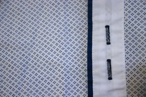 Close-up of a fabric pattern with neat stitching and a subtle design, ideal for Stock Photos
