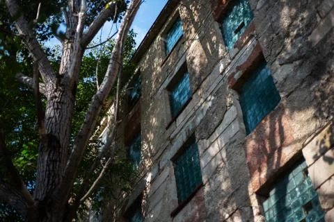 Close-up of facade background of abandoned building. Stock Photos