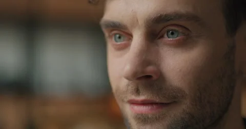 Close-up Face of Attractive Bearded Man with Beautiful Blue Eyes looking ahead Stock Footage 159224490