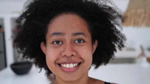 Close-up, face of attractive black multinational multiethnic mixed-race woman Stock Footage 242565505